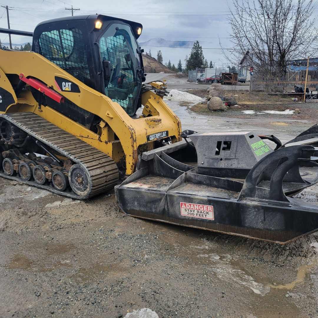 Skid steer brush cutter attachment for clearing brush and trees up to 8 inches diameter