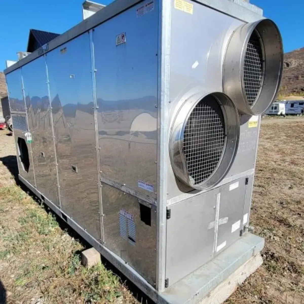 IMAC-4000 1.3 million BTU multi-fuel heater on skid, stainless housing with dual intake fans, Barriere, BC