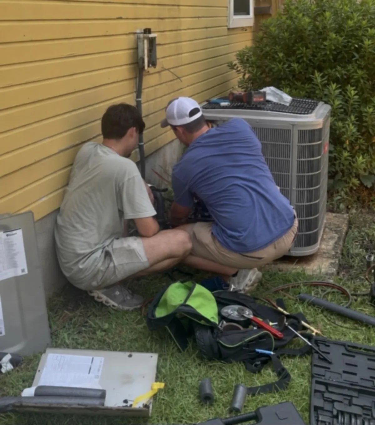 Tidwell Air Systems Installing HVAC unit