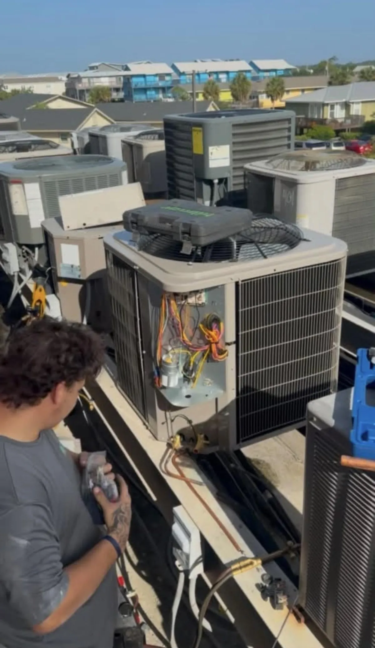 Tidwell Air Systems Team Working On HVAC Unit