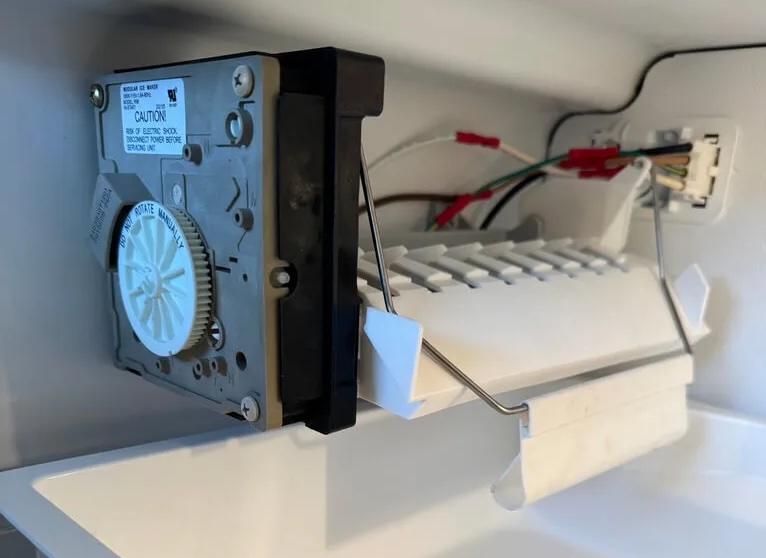 Refrigerator ice maker repair and assembly replacement in Vacaville California