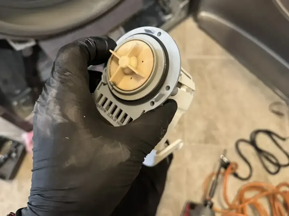 Washing machine drain pump replacement and drainage repair
