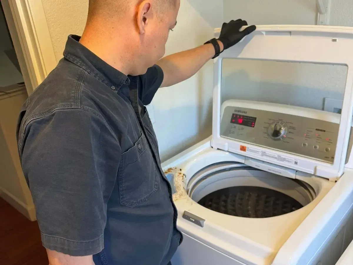 Washer balance repair and suspension rod replacement