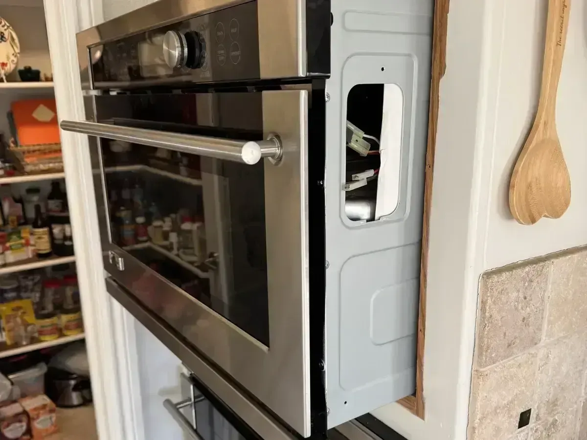 Built-in wall oven and gas cooktop serviced by appliance repair technician