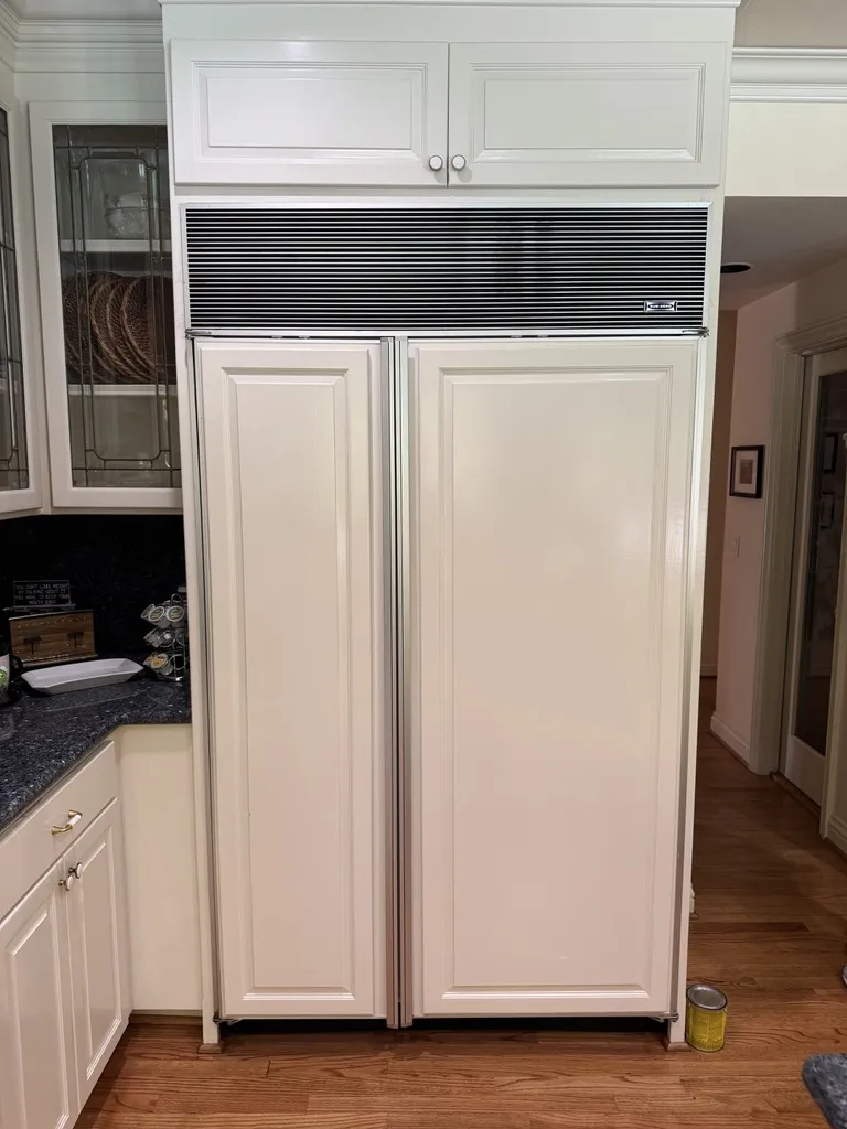 Built-in Sub-Zero refrigerator serviced for freezer ice buildup and a failed defrost thermostat in Citrus Heights