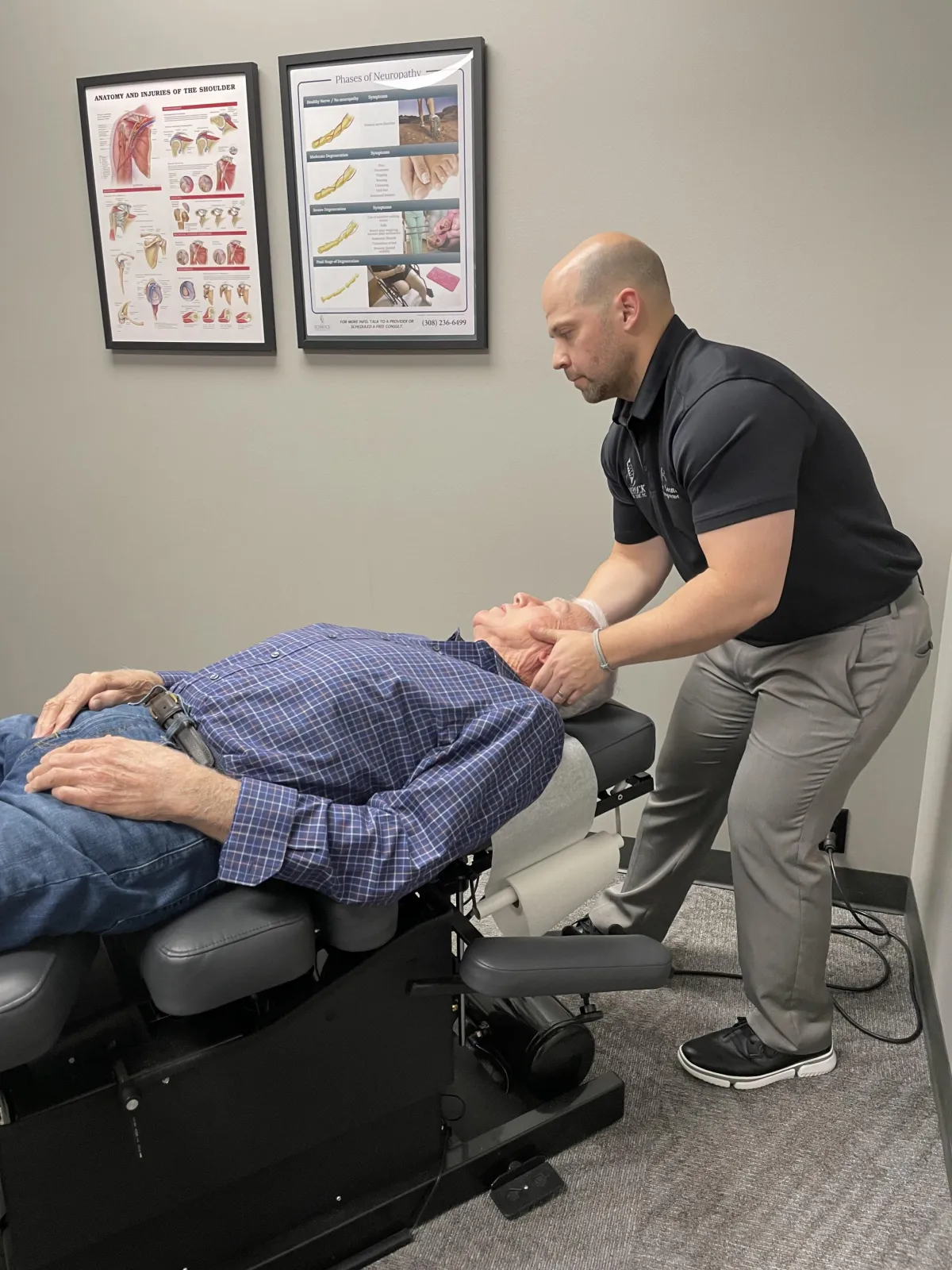 Patient receiving physical therapy and cold laser treatment for sciatica