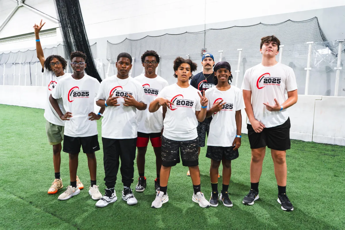 Youth athletes practicing teamwork and leadership through sports programs