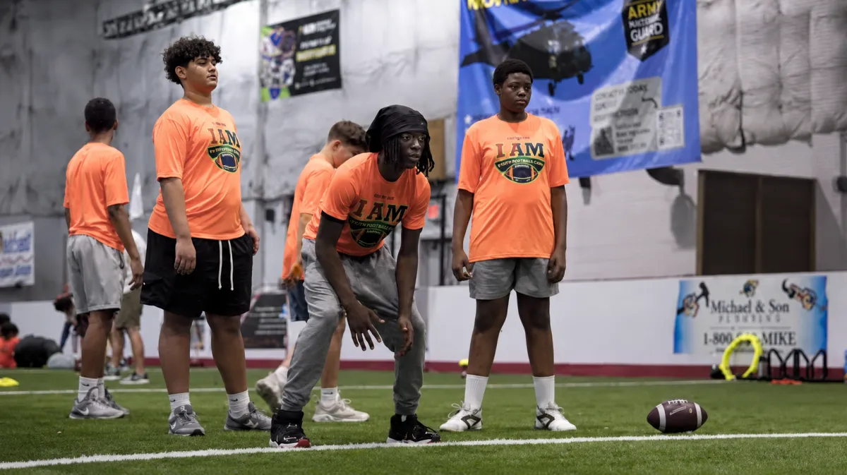 A moment from a youth football camp hosted by wise protective services & more in 2025