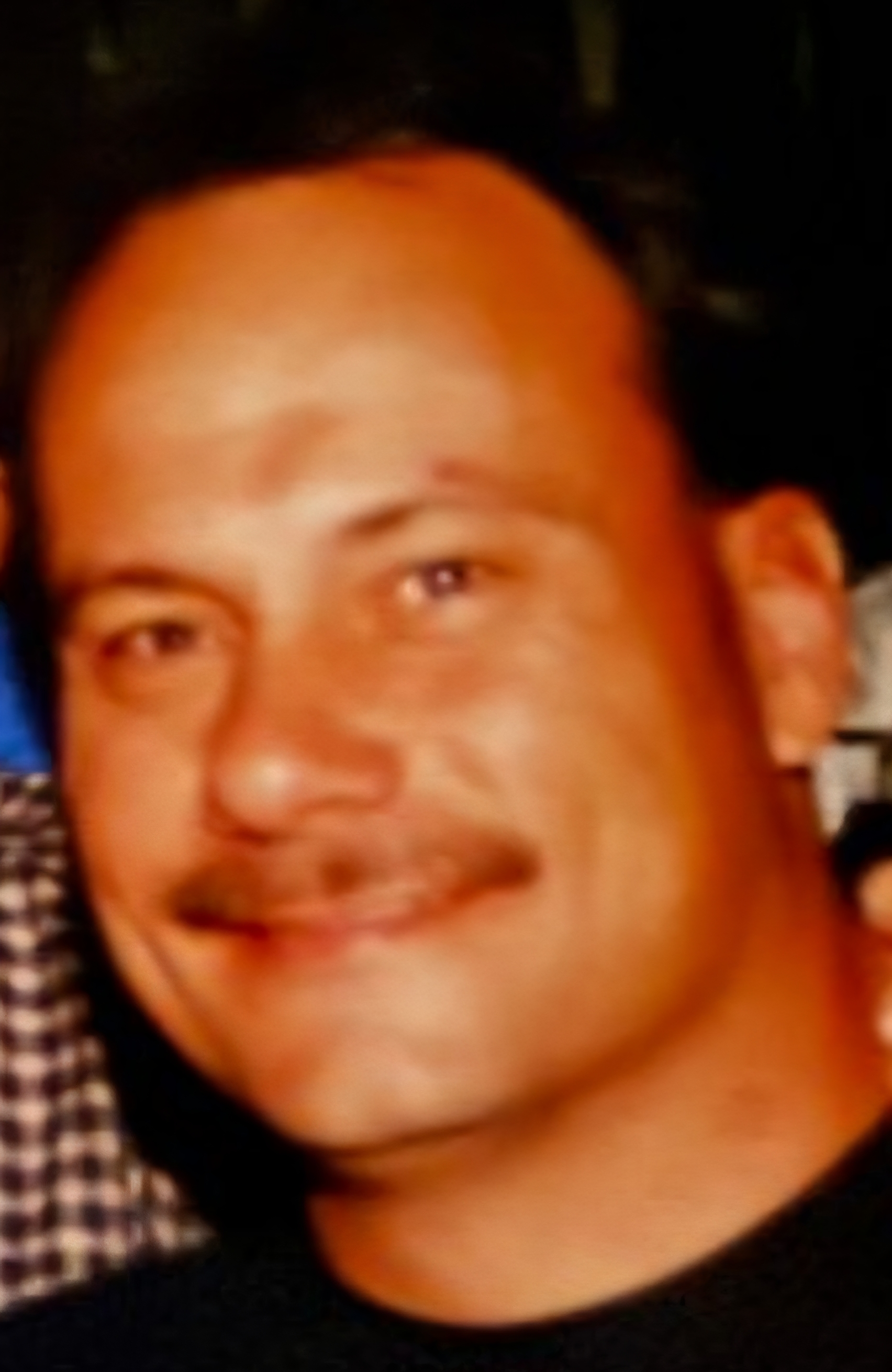 Portrait of a RedRock Demolition project manager, helmet and safety vest, representing trust and local expertise.