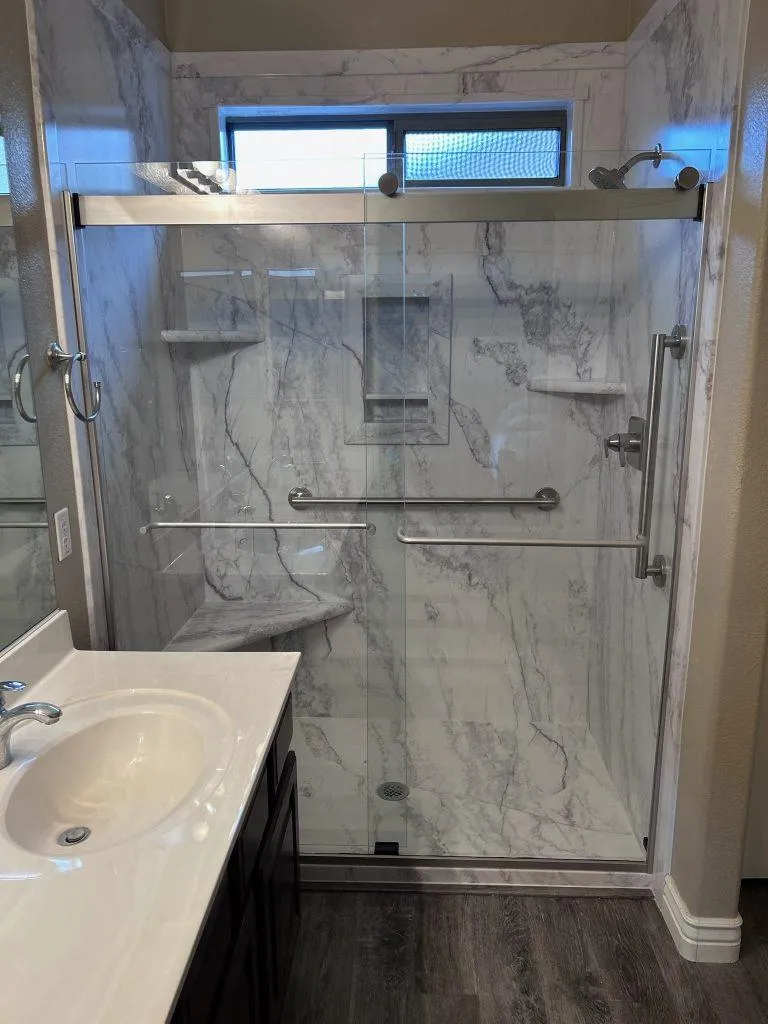 white ceramic sink near white ceramic sink