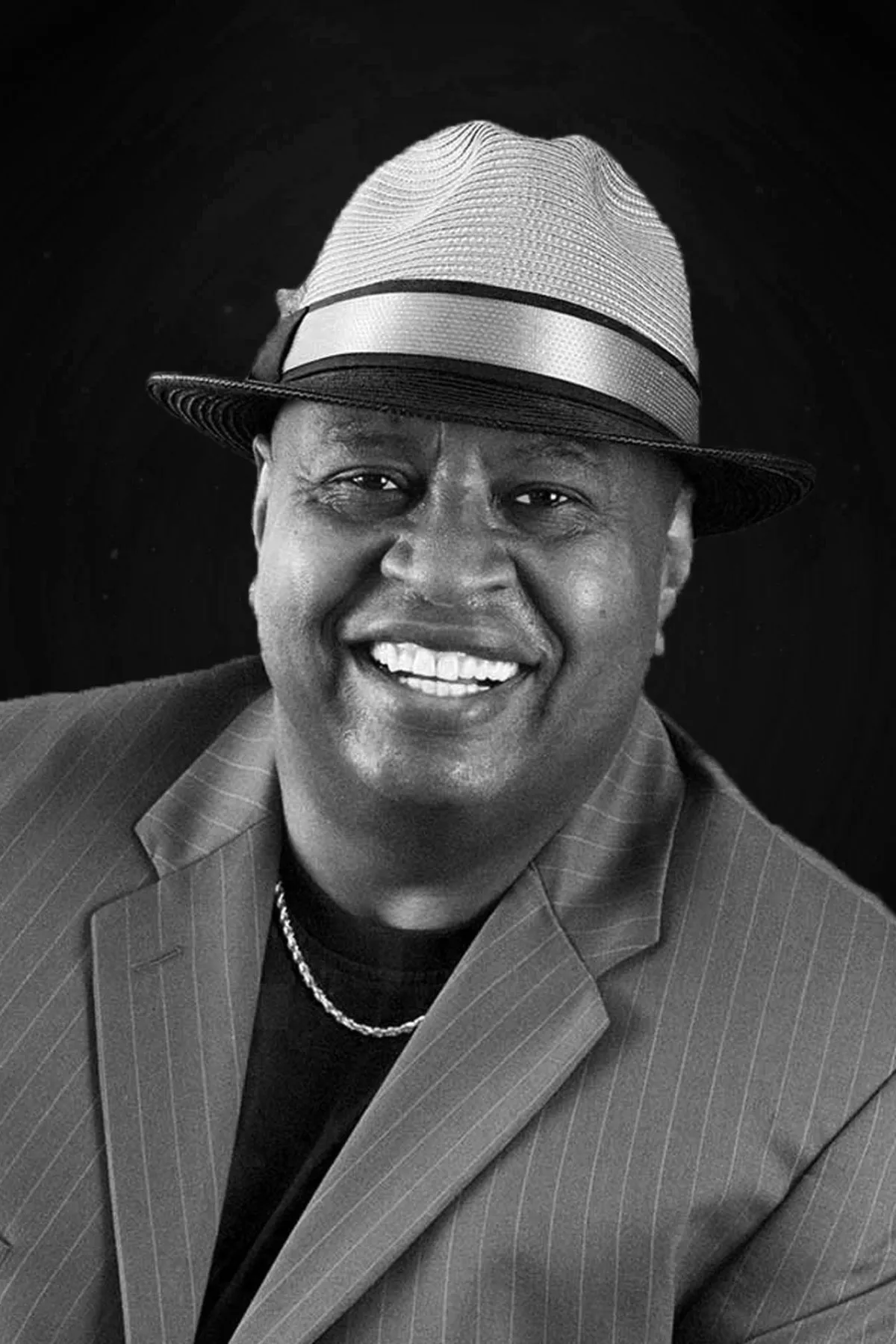 Jerry Bowden in a suit and hat