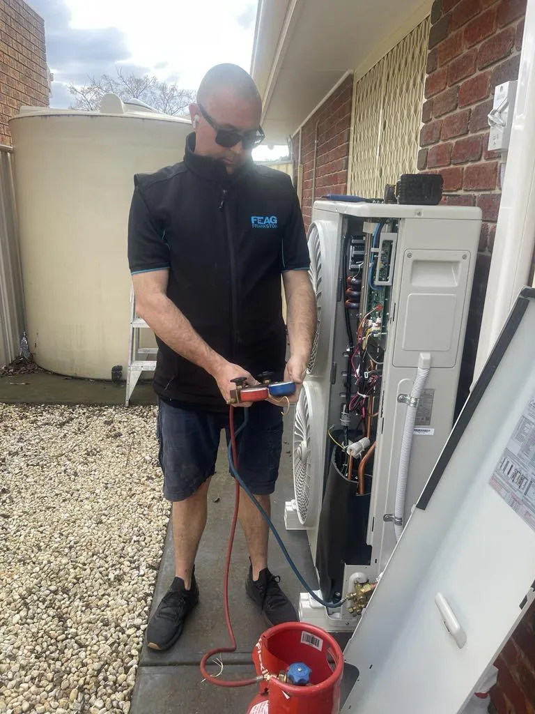 Licensed Frankston electrician testing AC Gas system