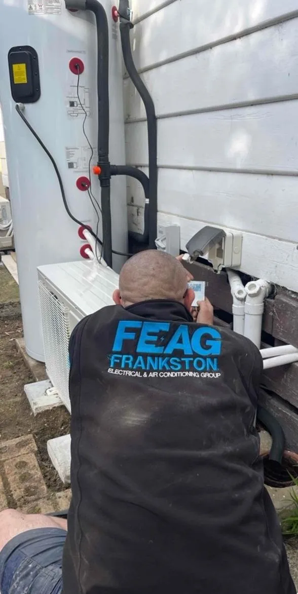 Ben Licensed  electrician working o  Ar Condiioning