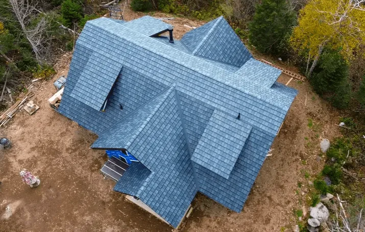 a shingle roofing of a house