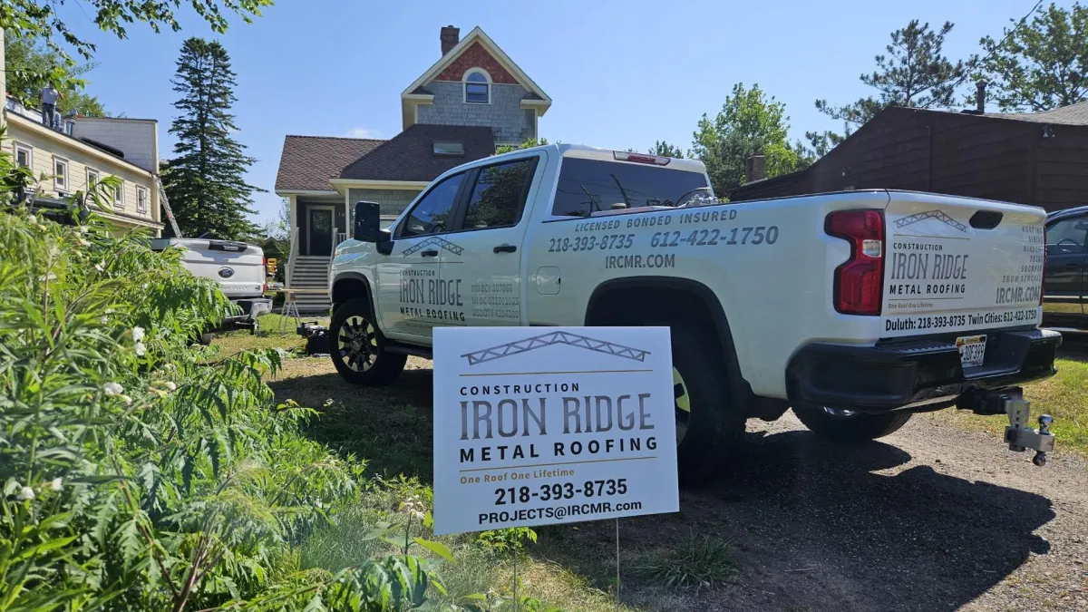 an iron ridge construction truck with banner