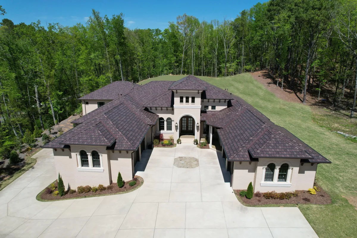 a house with shingle roofing