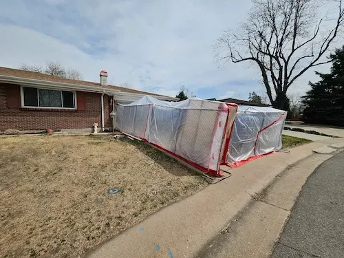 Colorado home undergoing professional asbestos remediation — The Property Buyers buys houses with asbestos as-is