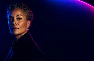 Woman profile under magenta light