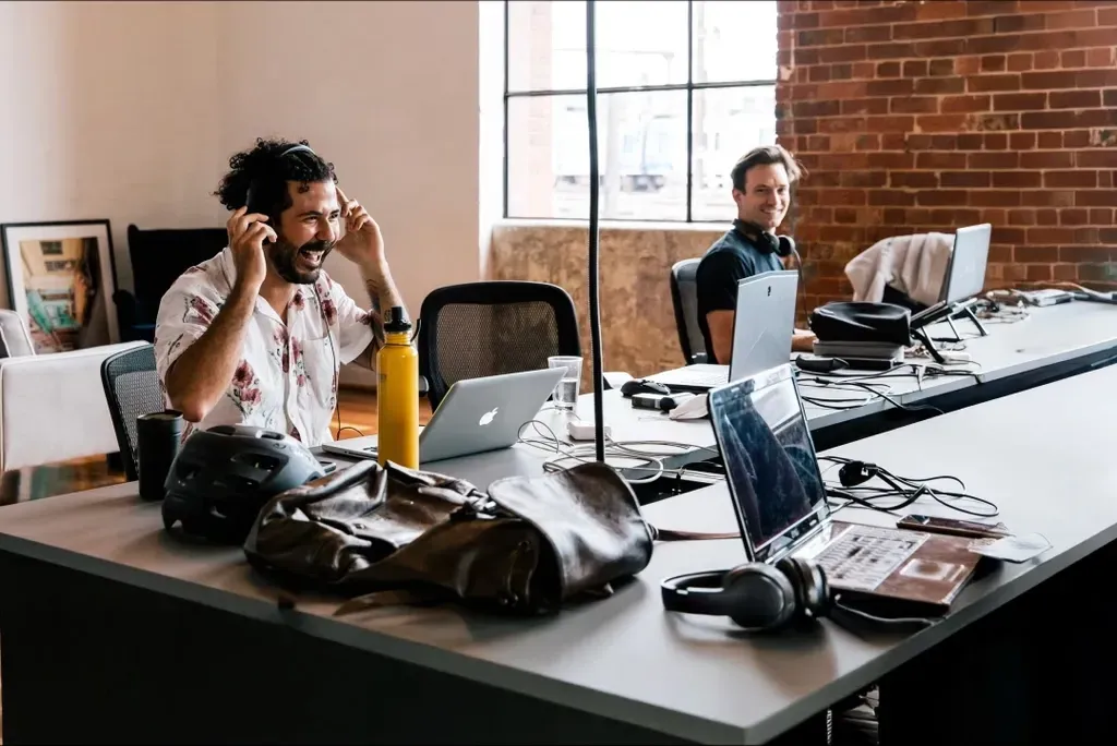Web designers sitting side by side in Sydney