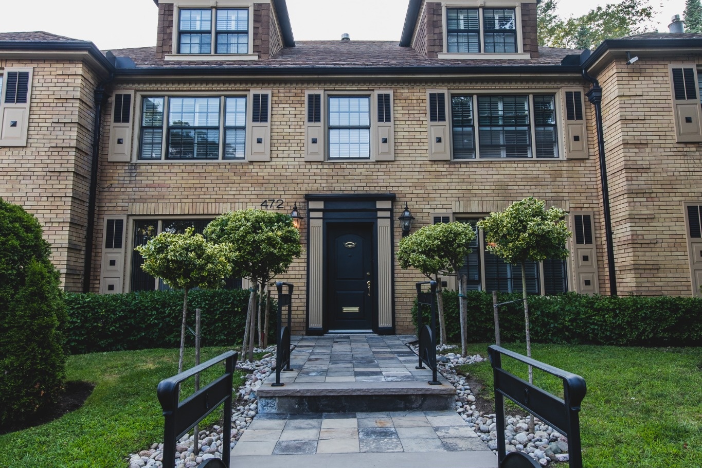 Suburban home with raised panel exterior shutters