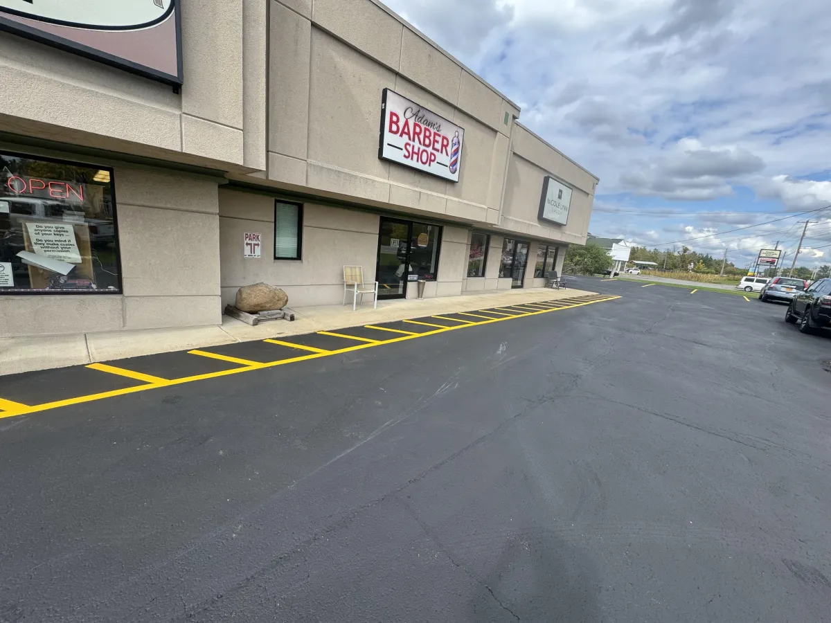freshly sealcoated and line striped parking lot