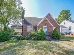 Compact rear deck with stairs and railings in Market Heights Canton