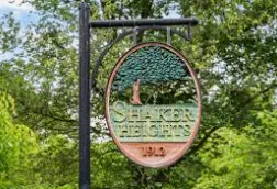 Covered cedar deck with seating and stairs in Shaker Heights Cleveland