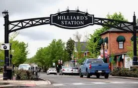 Covered composite deck with railings and seating area in Hilliard Columbus