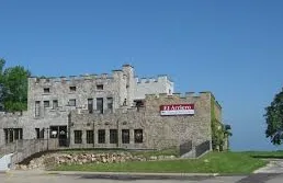 Spacious deck with pergola and seating area on Amherst lakefront home in Lorain
