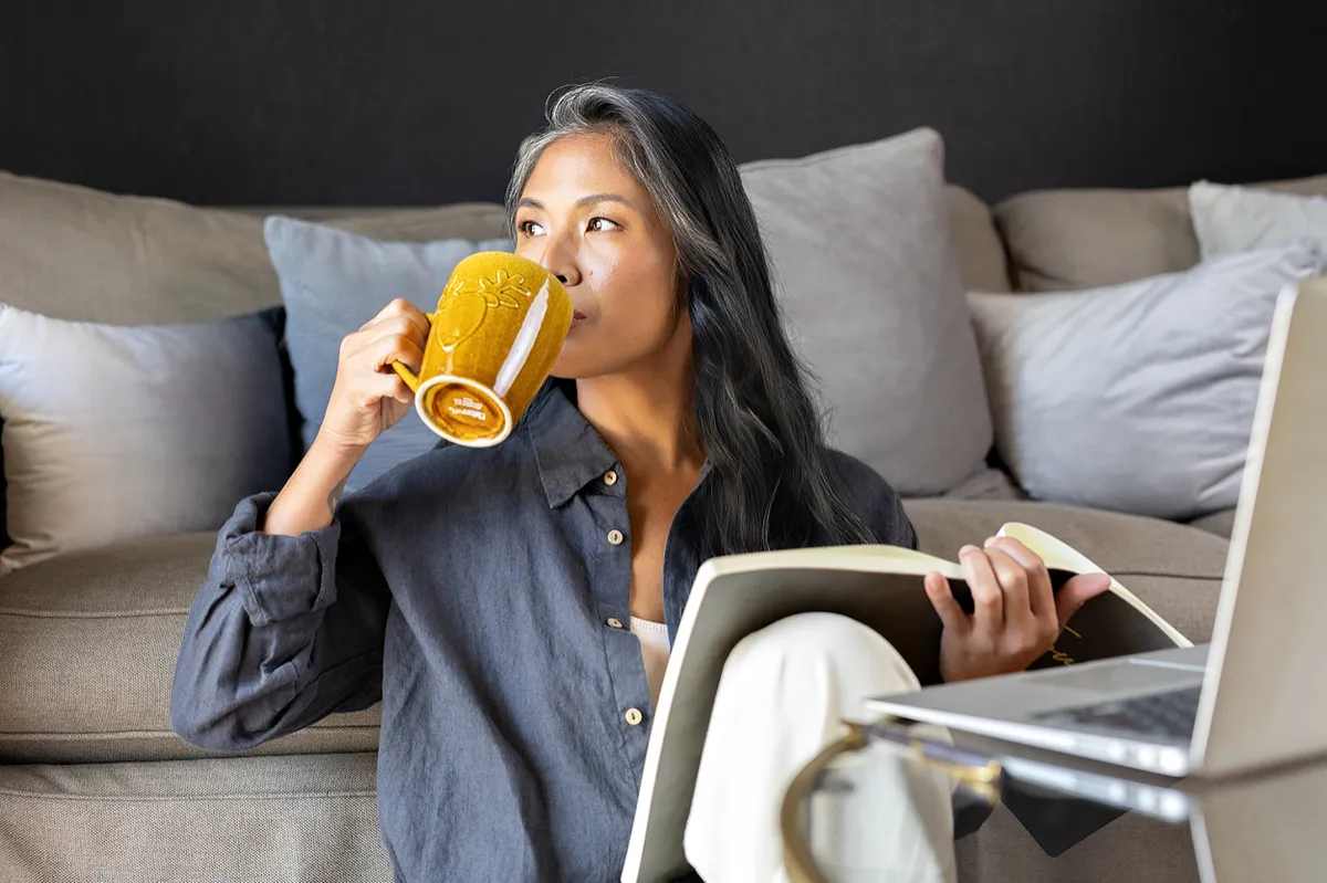 Fatima, HTMA practitioner and founder of The House of Vitality, enjoying a drink at home