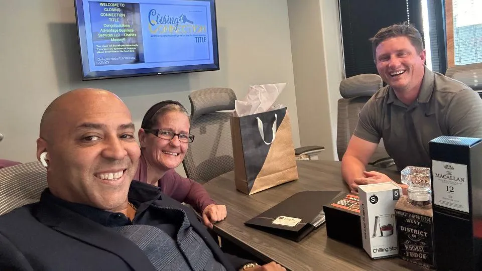 Double Advantage owner assisting a family during final home closing process
