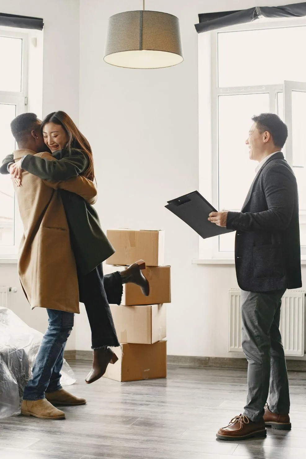Homeowners closing on a property with help from real estate experts at Double Advantage Business Services