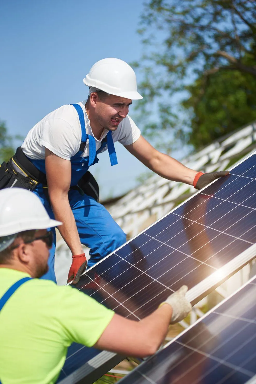 Solar energy technicians installing high-efficiency rooftop panels as part of a residential solar project by Double Advantage Business Services