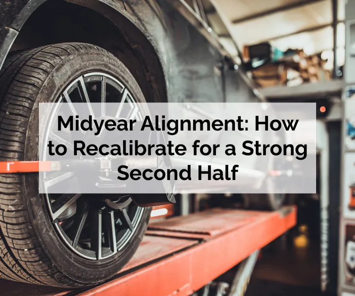 Midyear Alignment: How to Recalibrate for a Strong Second Half - car on lift getting tires aligned
