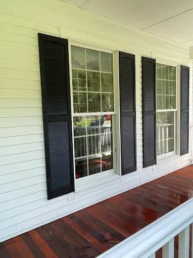 Exterior window cleaning by Thin Red Line Pressure Washing in Clifton Park, NY.