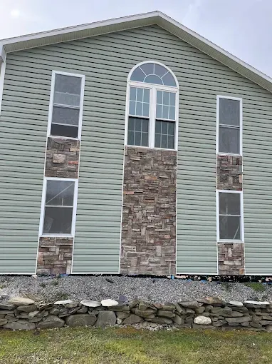 Specialty exterior stain removal service by Thin Red Line Pressure Washing in Clifton Park, NY.