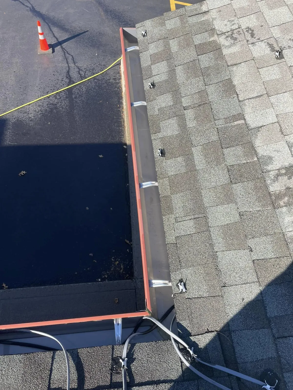 Gutter cleaning service by Thin Red Line Pressure Washing in Clifton Park, NY.