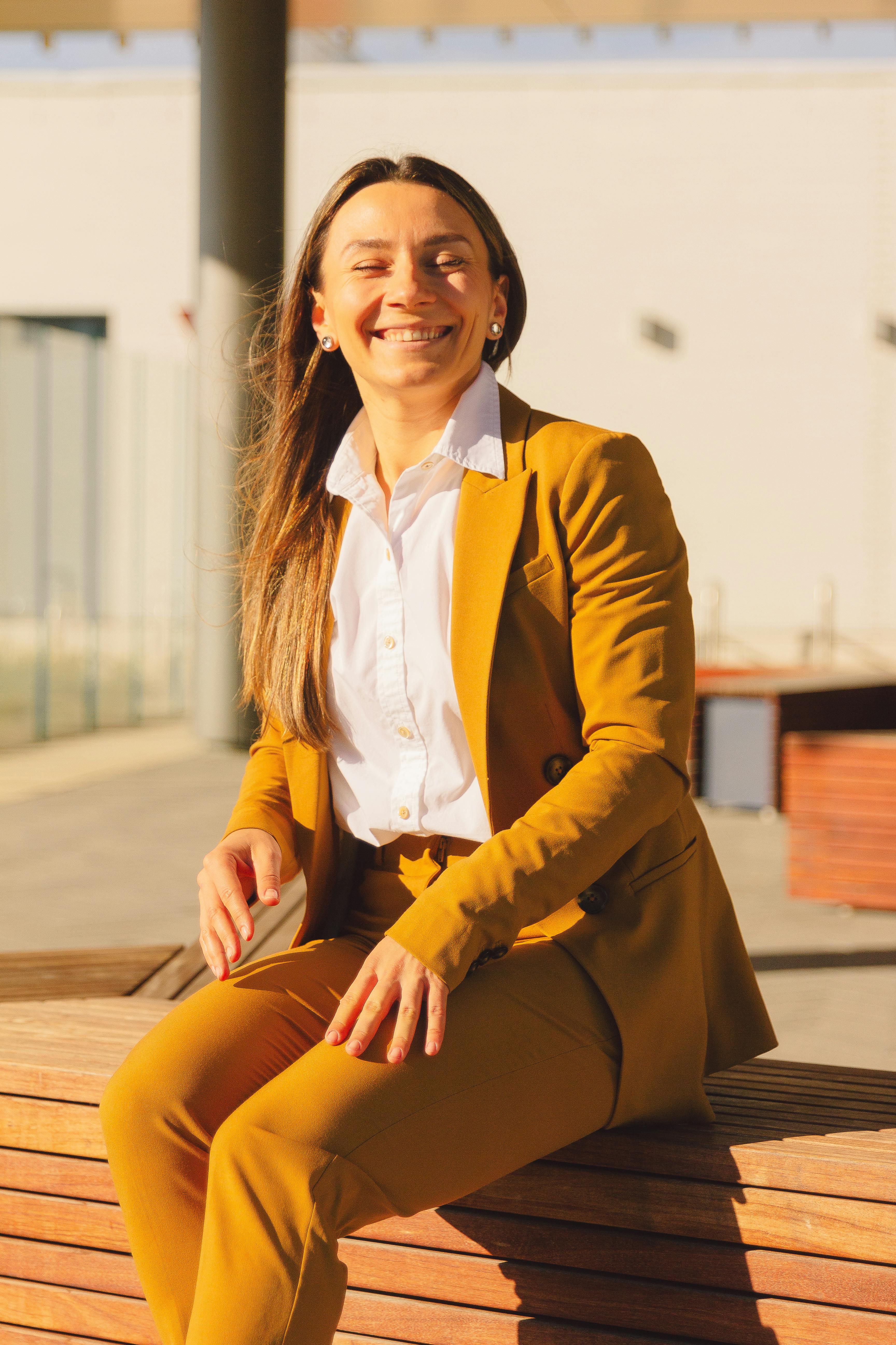 a group of people standing on top of a lush green field