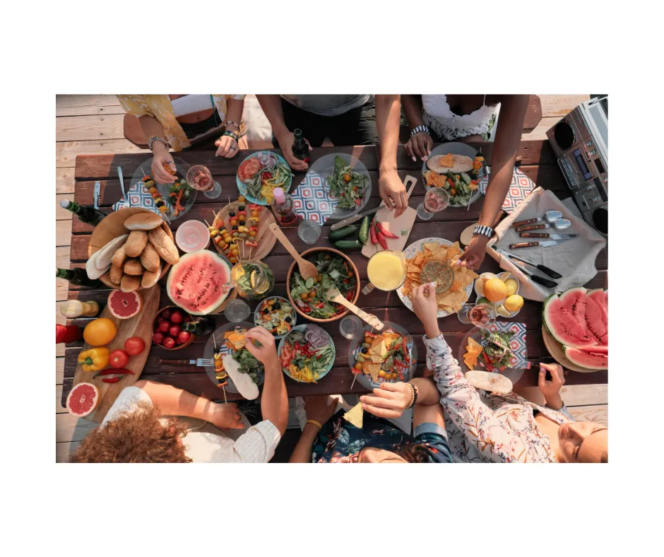 a the table eating the farm goods