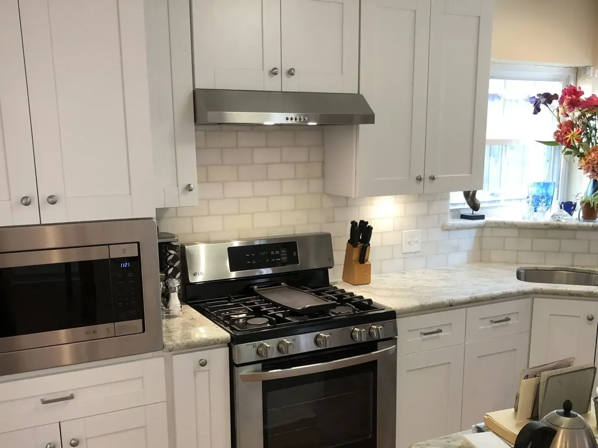 Freshly remodeled bathroom in Spring TX with modern design, polished marble, chrome fixtures, and natural light.
