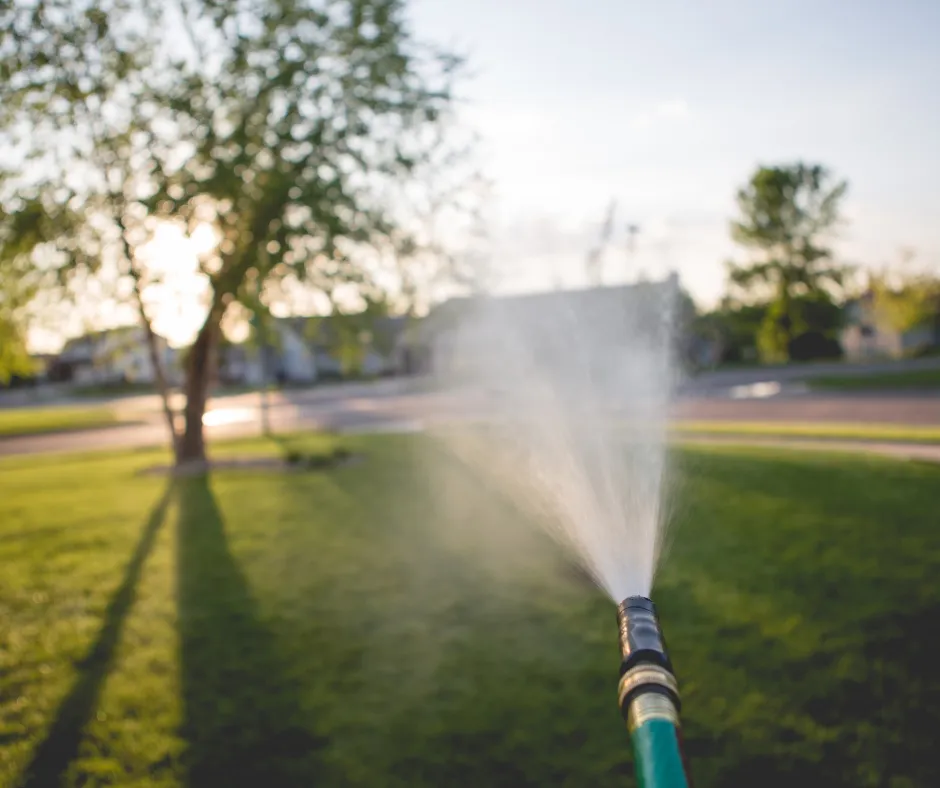 Eco Lawn Utah technician carefully applying weed control to a property in Park City, Utah. 