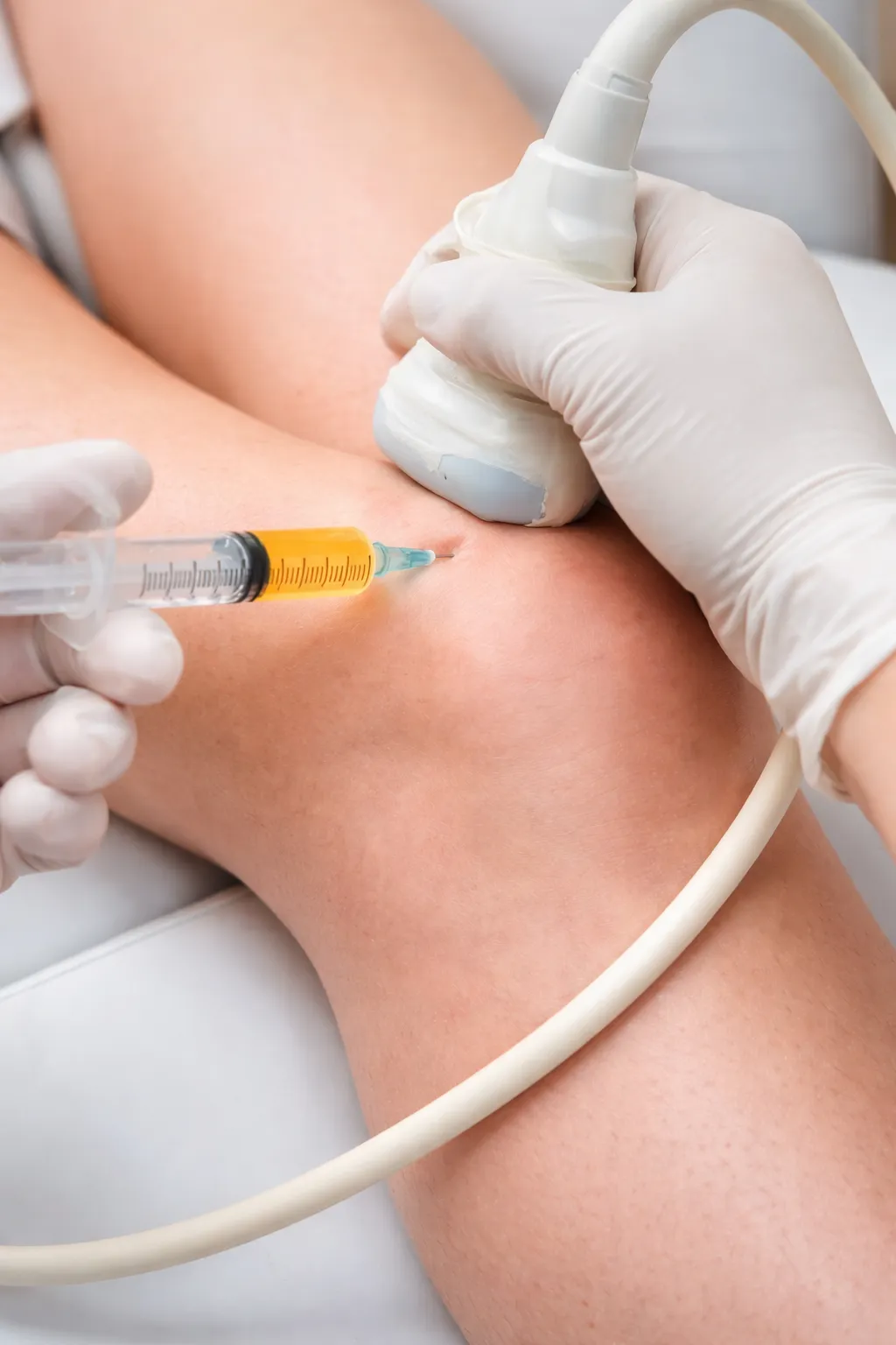 Doctor consults with patient via video call.