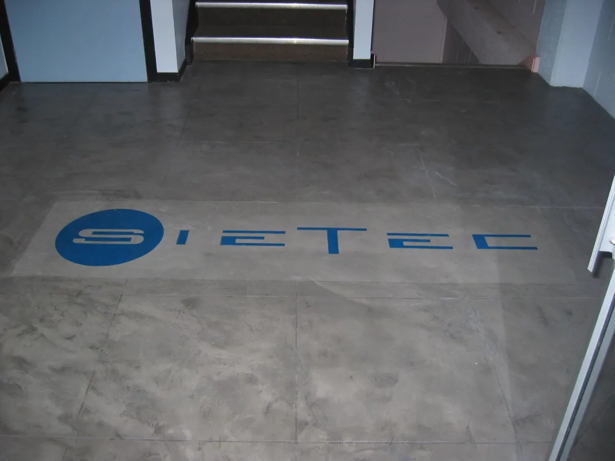 Stained logo in Cretecova resufacing