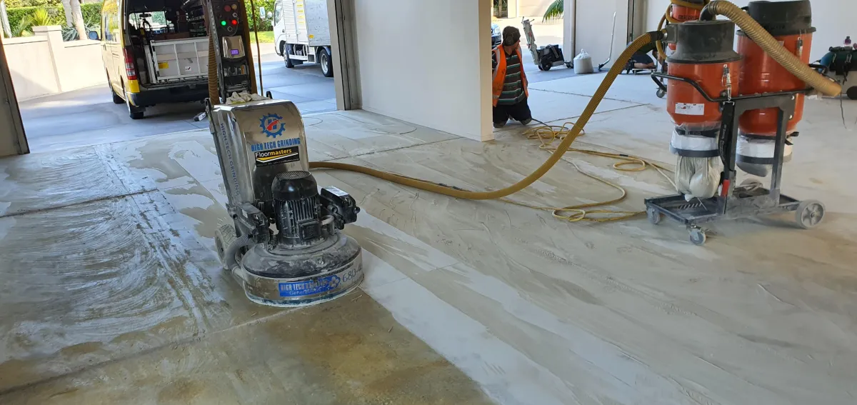Preparation grinding of a concrete floor