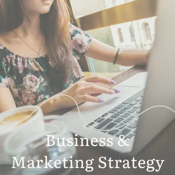 lady sat with laptop, flowery top and coffee, business and marketing strategy  for business women mastermind, women with chronic illness