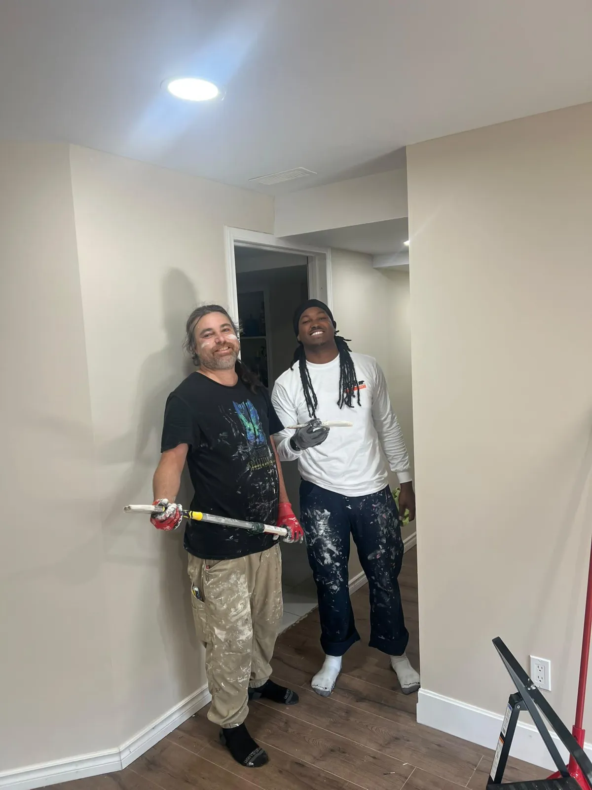 Professional painter applying interior wall paint for a residential home in Ottawa, ON | OTT Painters