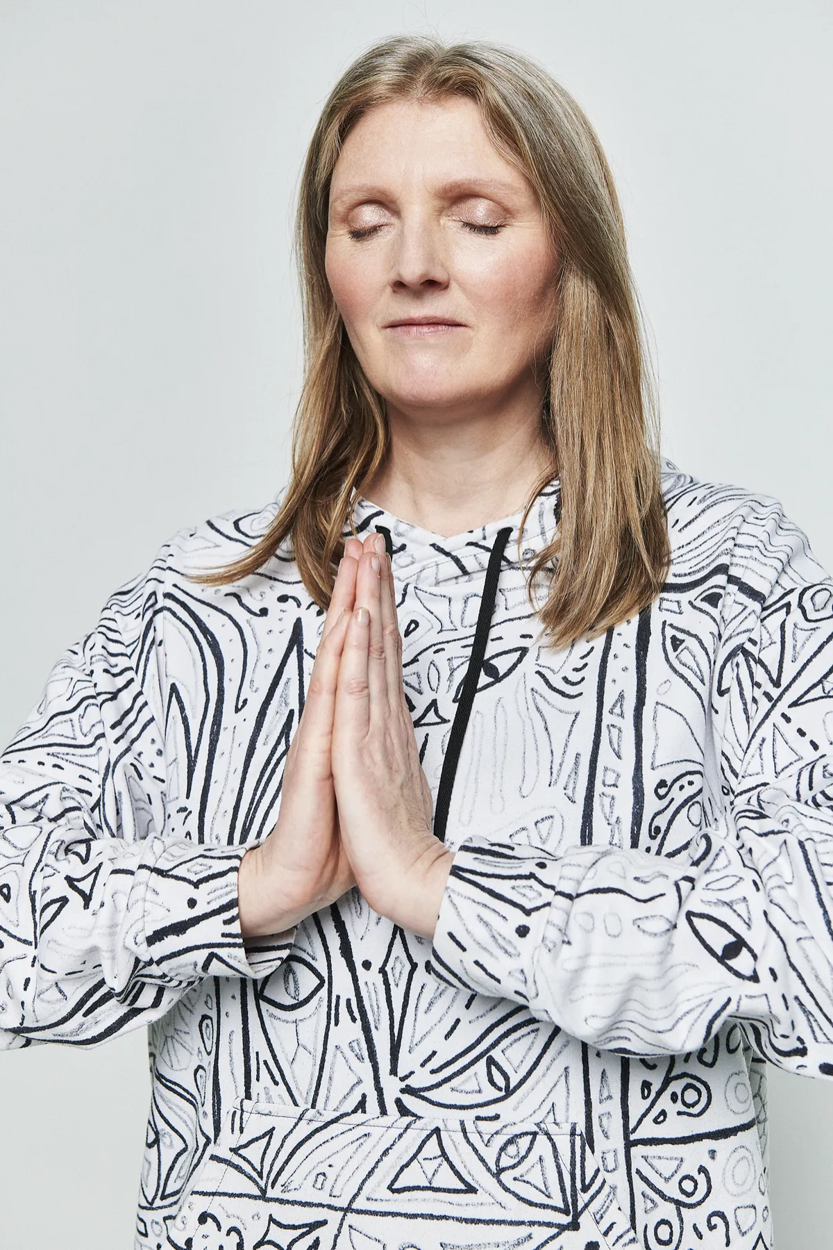 Dirkje Bakker-Pierre aka Derrekien with prayer hands before a session (anjali mudra)