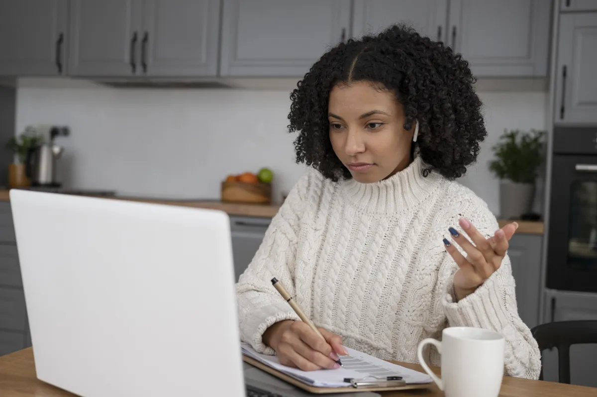 man holding incandescent bulb