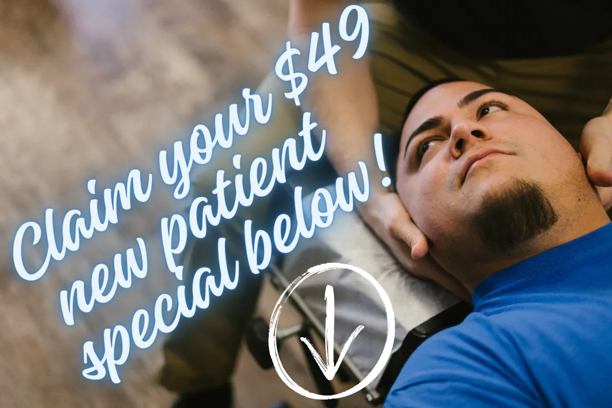 Chiropractor performing spinal adjustment in Des Moines