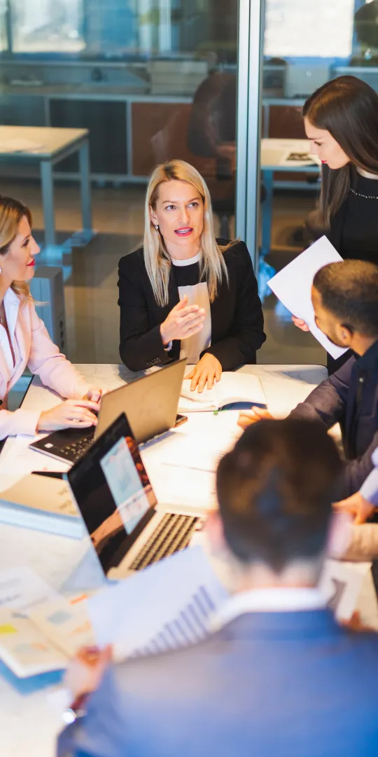 Business professionals working together to support organizational change.